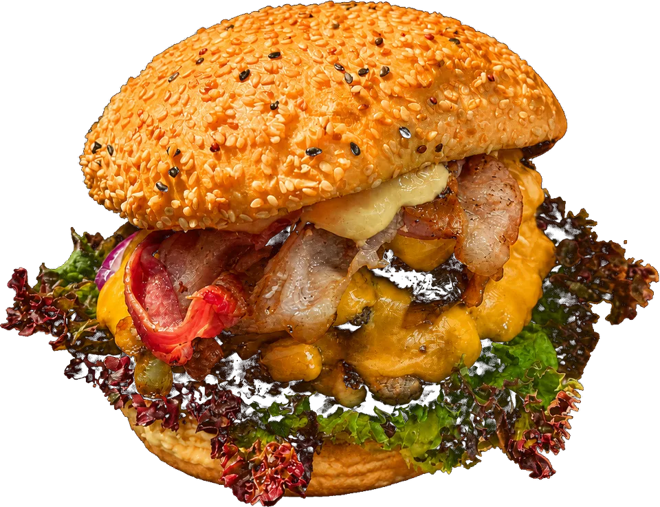 Cheeseburger mit Bacon und Salat im Sesambrötchen